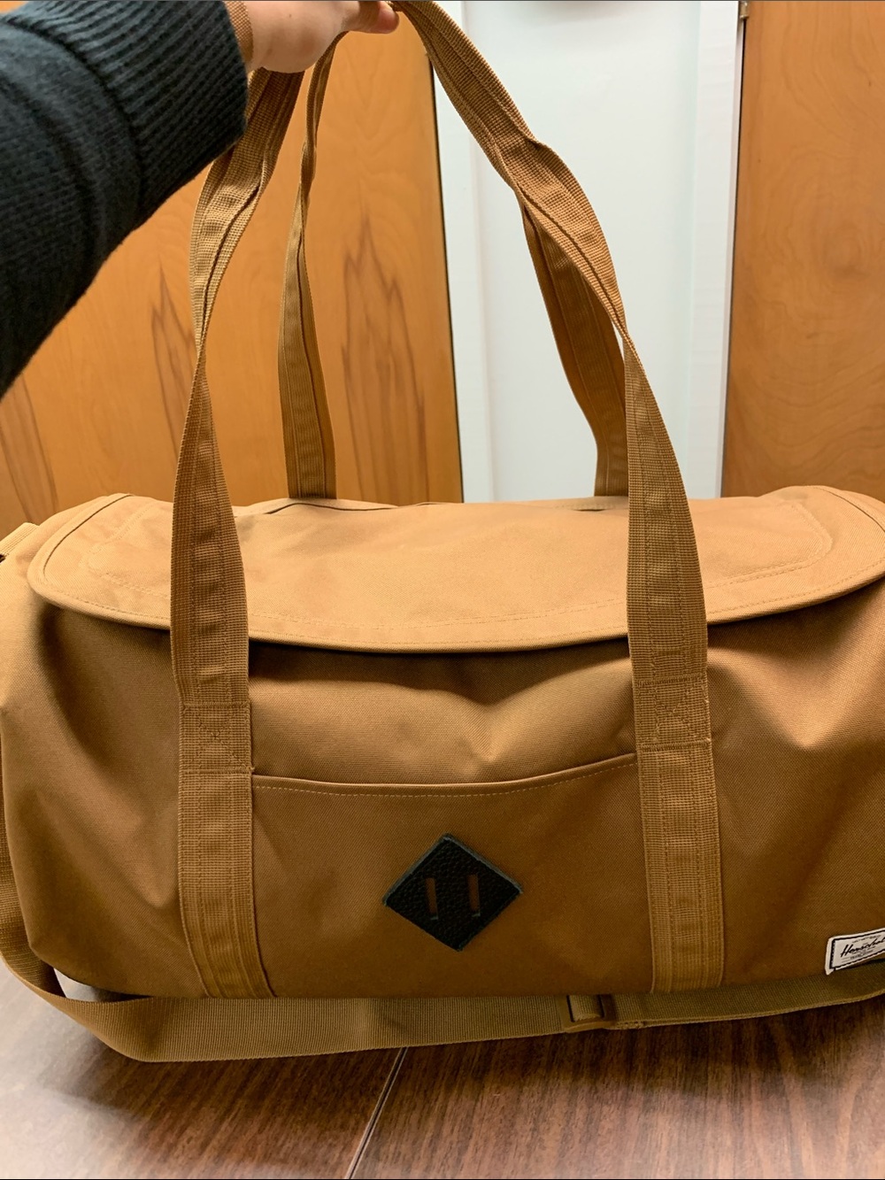 Like-new Herschel Supply Co. Tan Canvas Duffel Bag with Shoulder Strap